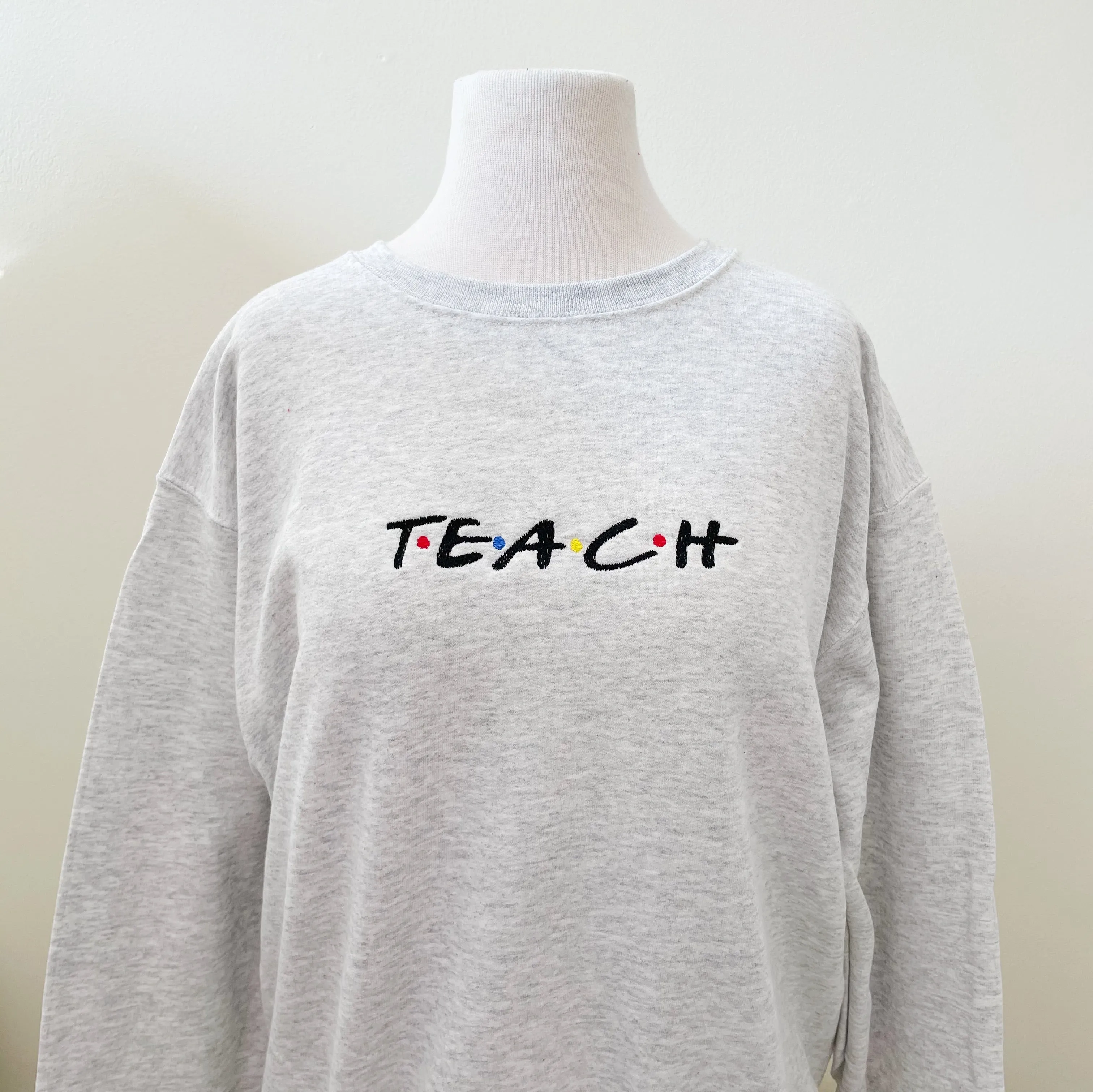 Teach Embroidered Sweatshirts